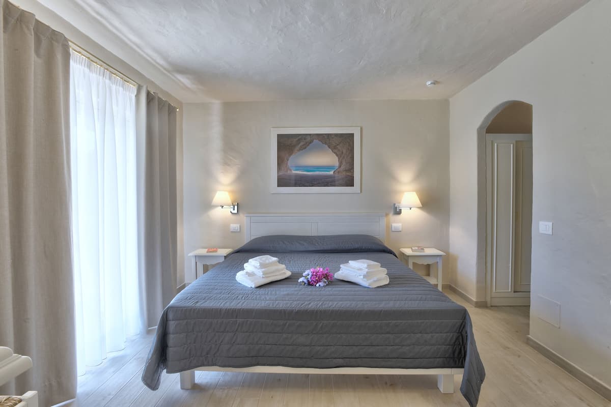 Junior Suite, Terrace | Minibar, in-room safe, free WiFi