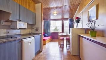 Fridge, microwave, cookware/dishes/utensils