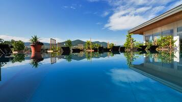 Outdoor pool, sun loungers