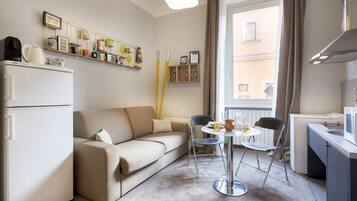 Habitación Deluxe | Ropa de cama de alta calidad, edredones de plumas, minibar y caja fuerte