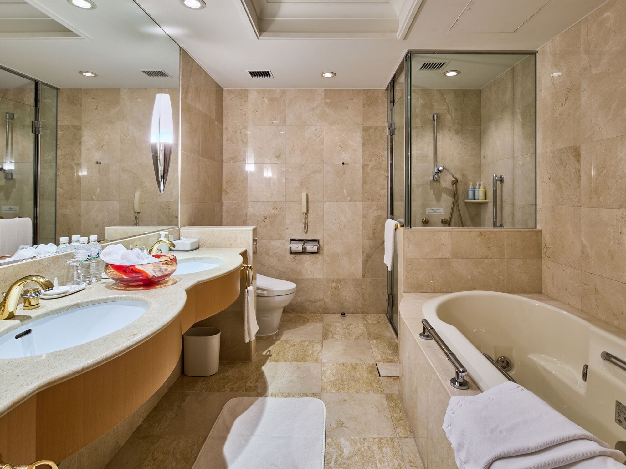 combined shower/bathtub, free toiletries, hair dryer, slippers