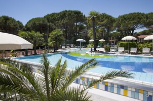 Outdoor pool, pool umbrellas, sun loungers