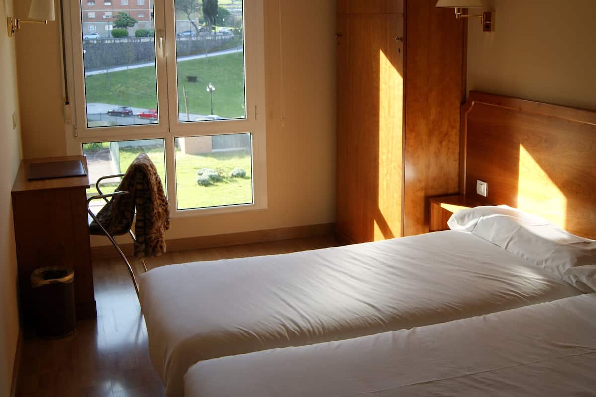 twin room | minibar, in-room safe, desk, iron/ironing board