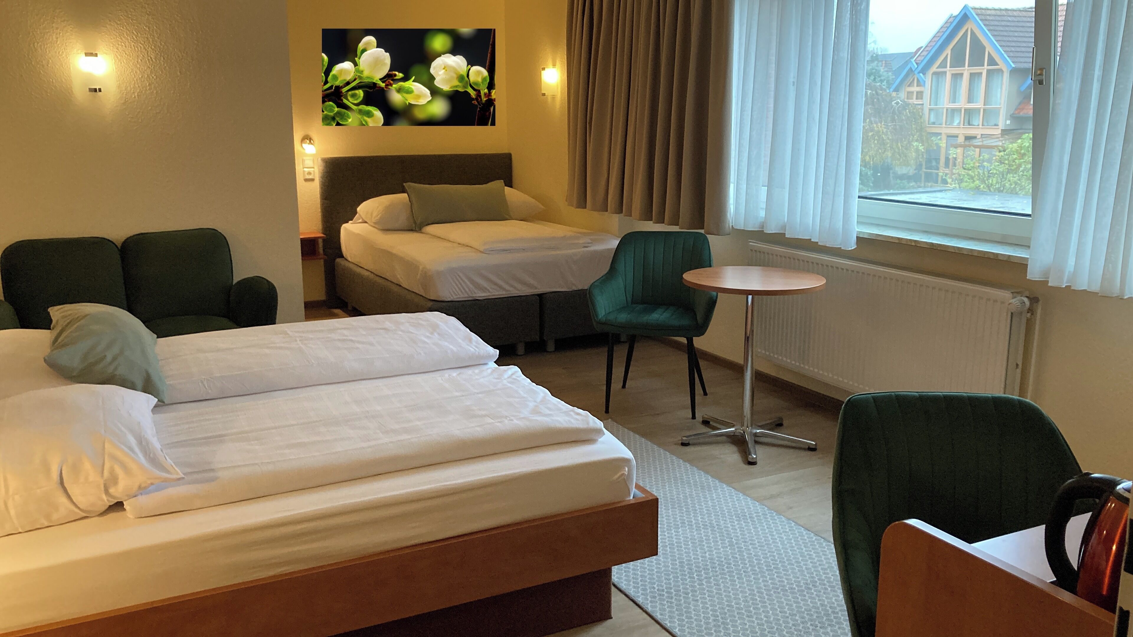 Triple Room | Desk, blackout drapes, iron/ironing board (on request), WiFi (free)