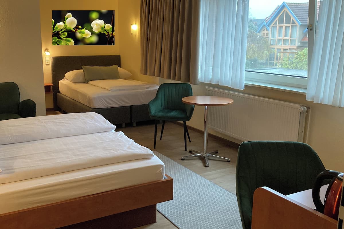 Triple Room | Desk, blackout curtains, iron/ironing board (on request), free WiFi