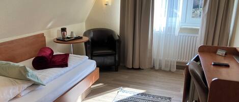 Desk, blackout drapes, iron/ironing board (on request), WiFi (free)