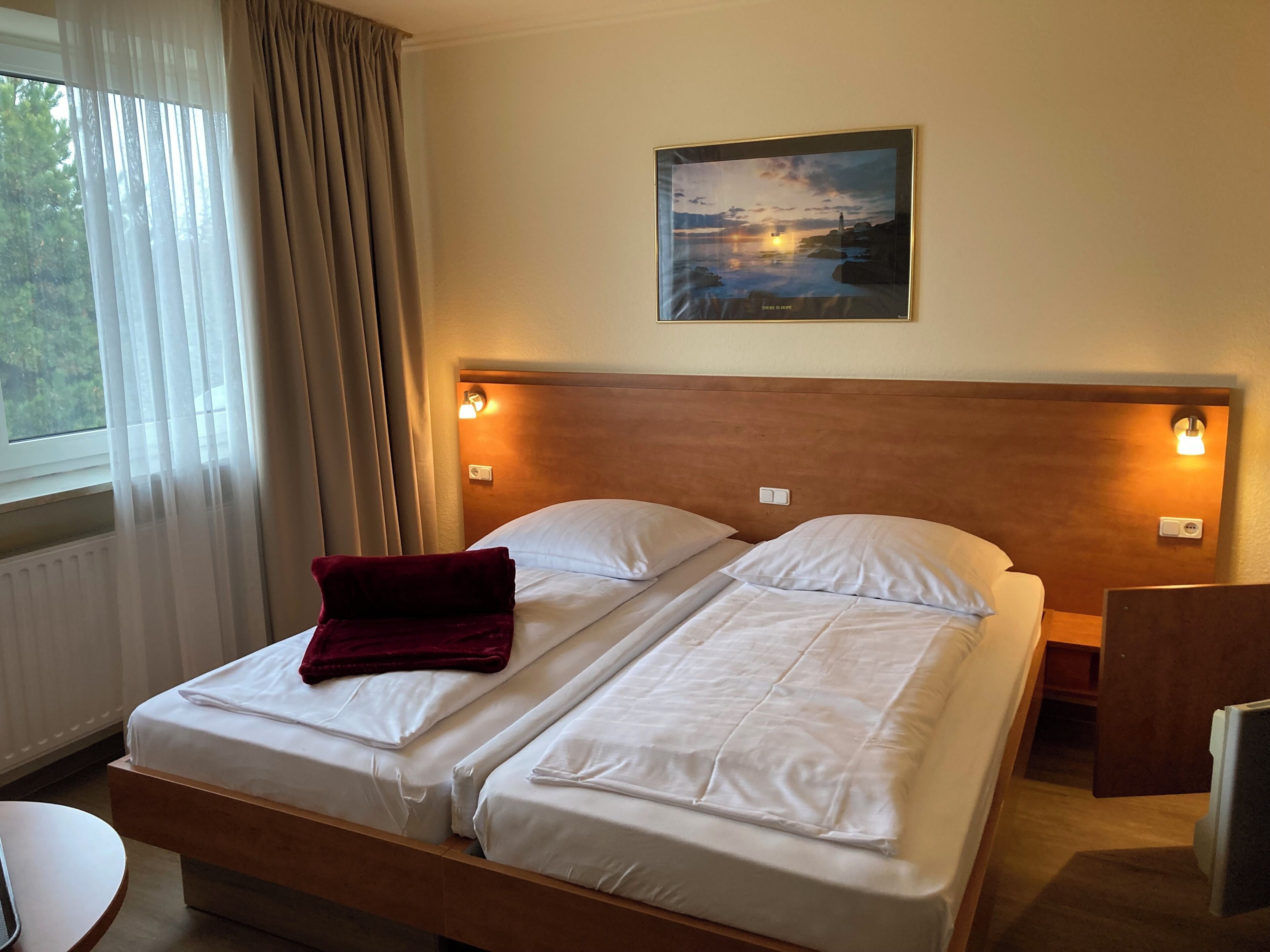 Economy Double Room | Desk, blackout drapes, iron/ironing board (on request), WiFi (free)