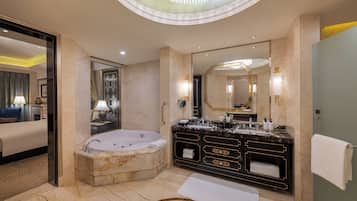 Separate tub and shower, rainfall showerhead, designer toiletries
