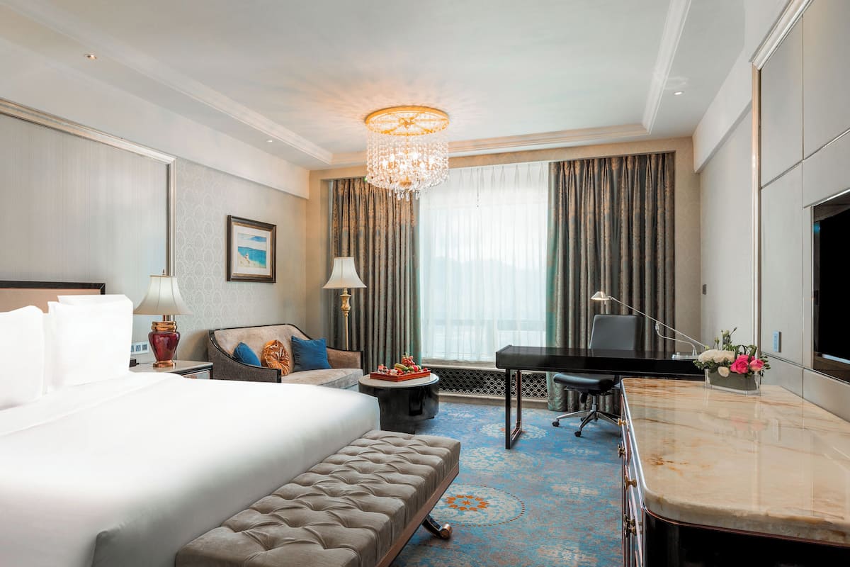 Classic Room (Upgrade) | Minibar, in-room safe, desk, iron/ironing board