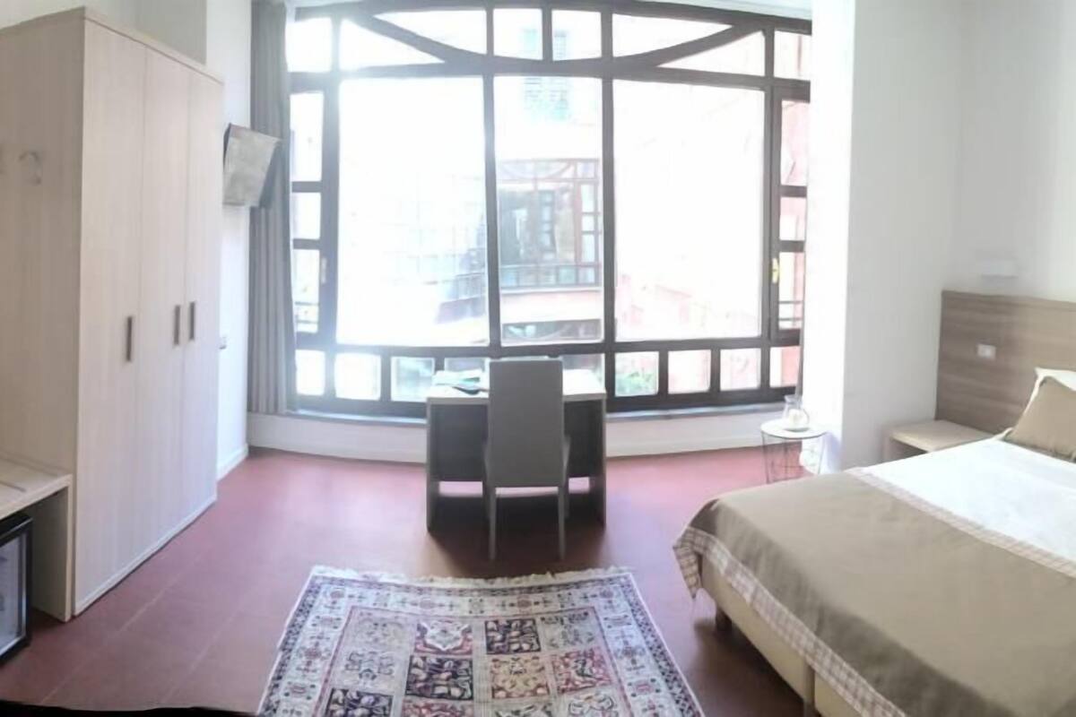 double room | minibar, in-room safe, blackout curtains, iron/ironing board