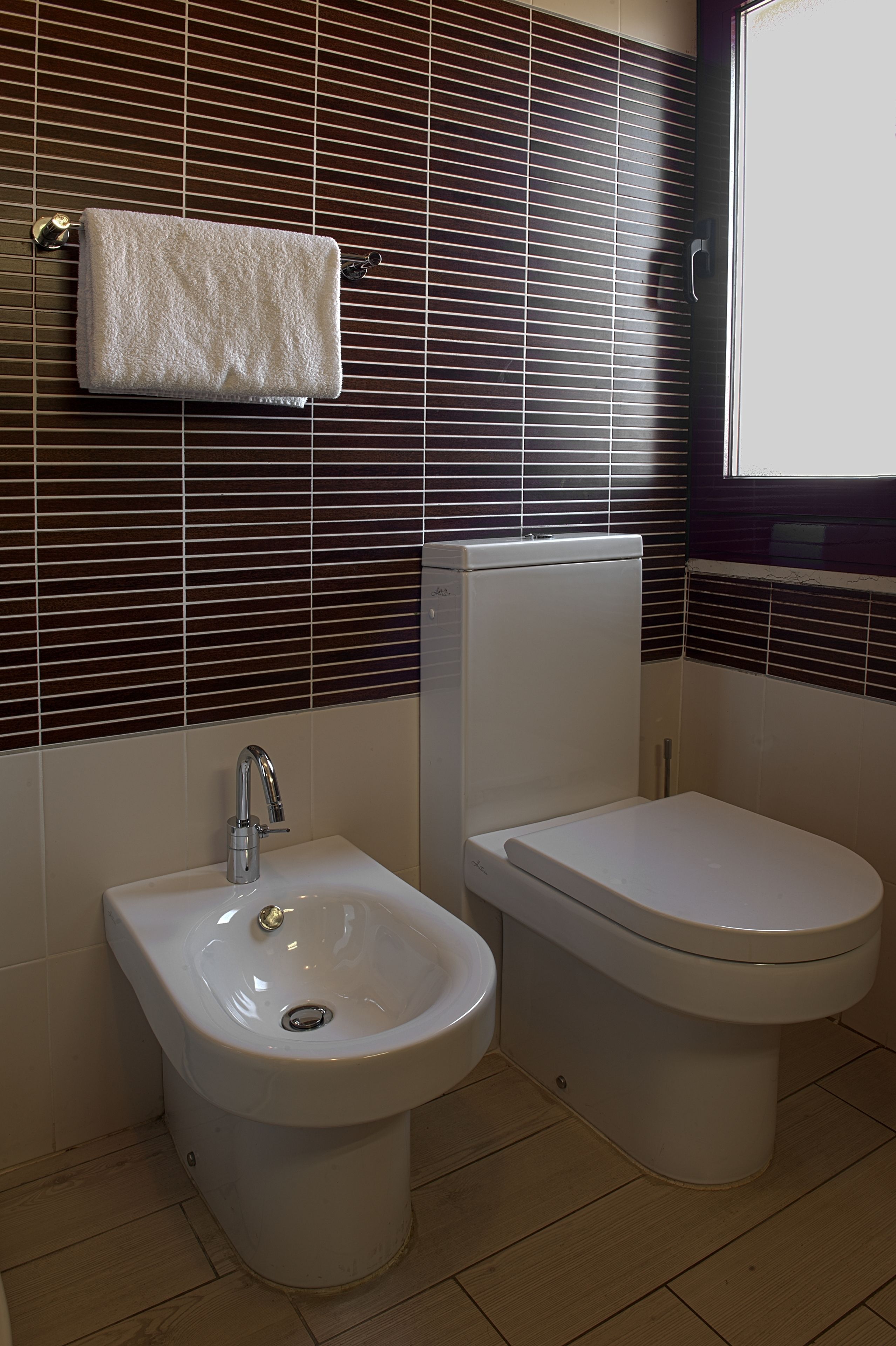 superior double room | bathroom | hair dryer, towels