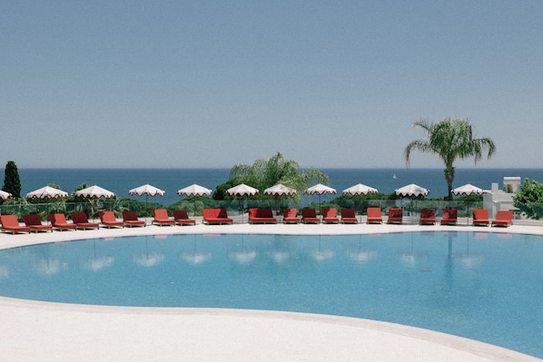 2 outdoor pools, open 10:00 AM to 8:00 PM, pool umbrellas, sun loungers