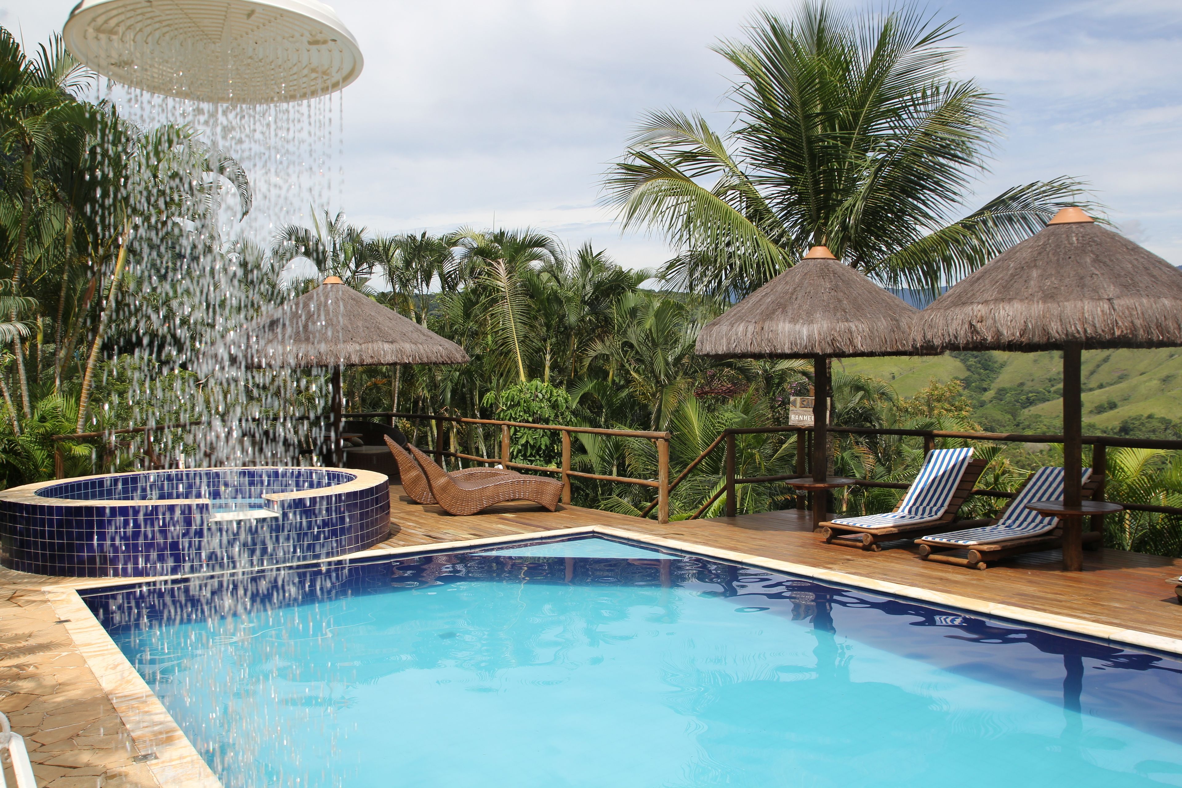 Outdoor pool, free pool cabanas, pool umbrellas