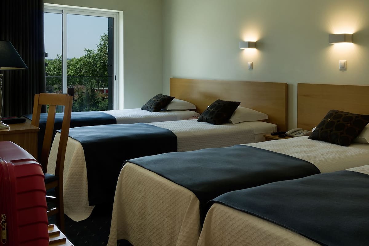 family room | desk, blackout curtains, soundproofing, free cots/infant beds