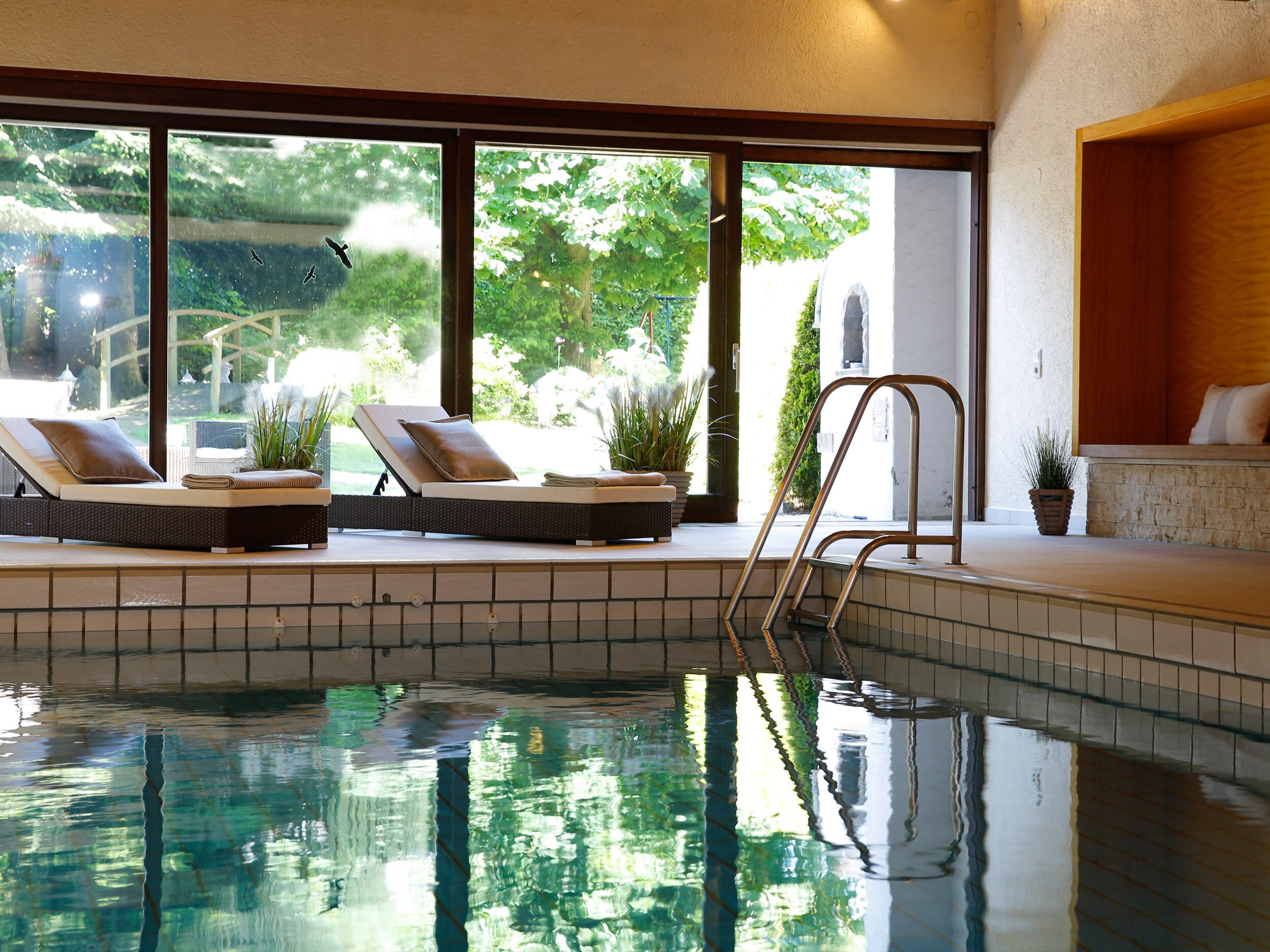 indoor pool, open 3:00 pm to 9:00 pm, pool loungers