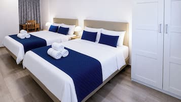 Quadruple Room | Pillow-top beds, soundproofing, free WiFi, bed sheets