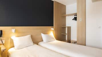 Economy Double or Twin Room, 2 Twin Beds | Desk, free cribs/infant beds, free WiFi, bed sheets