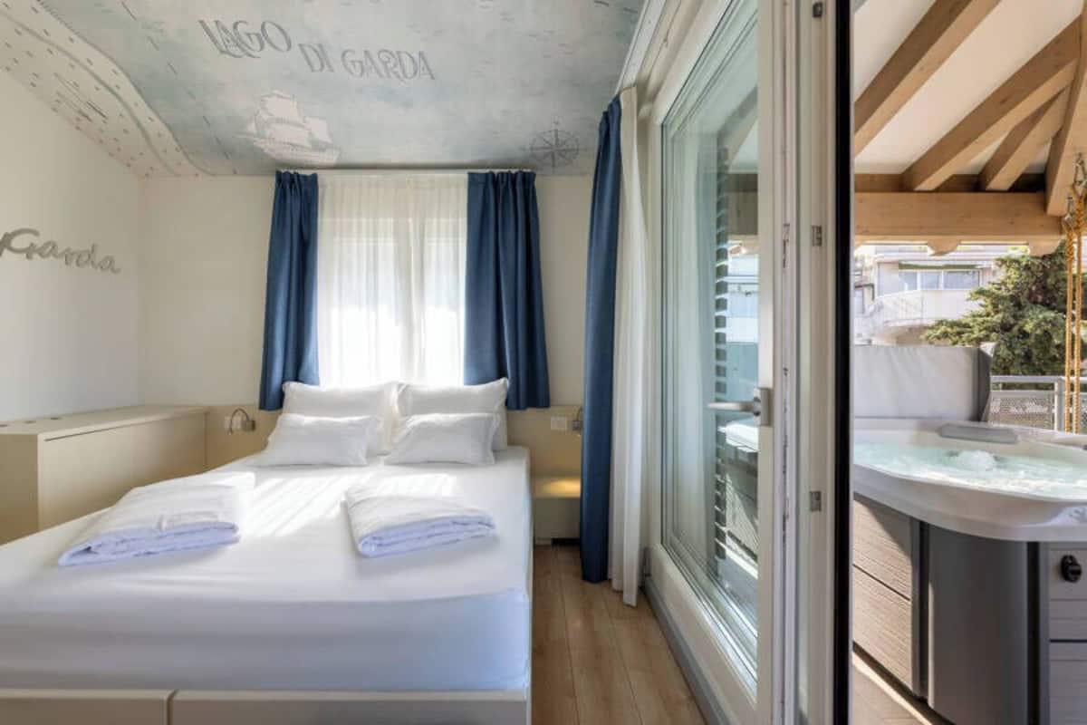 Deluxe Room, Terrace Lake View, Hot Tub | Frette Italian sheets, premium bedding, minibar, in-room safe