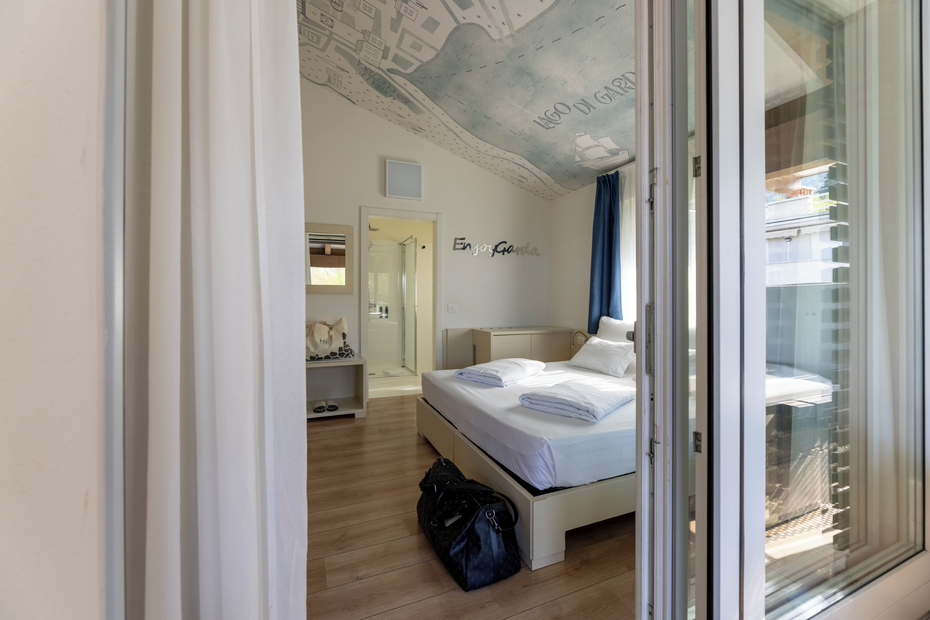 superior room, lake view | 1 bedroom, frette italian sheets, premium bedding, minibar