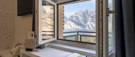 Superior Triple Room, Lake View | Frette Italian sheets, premium bedding, minibar, in-room safe