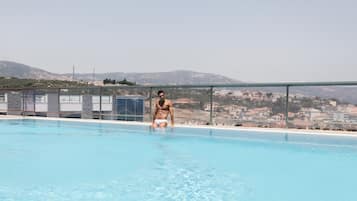 2 outdoor pools, a rooftop pool, open 9:00 AM to 6:00 PM, sun loungers