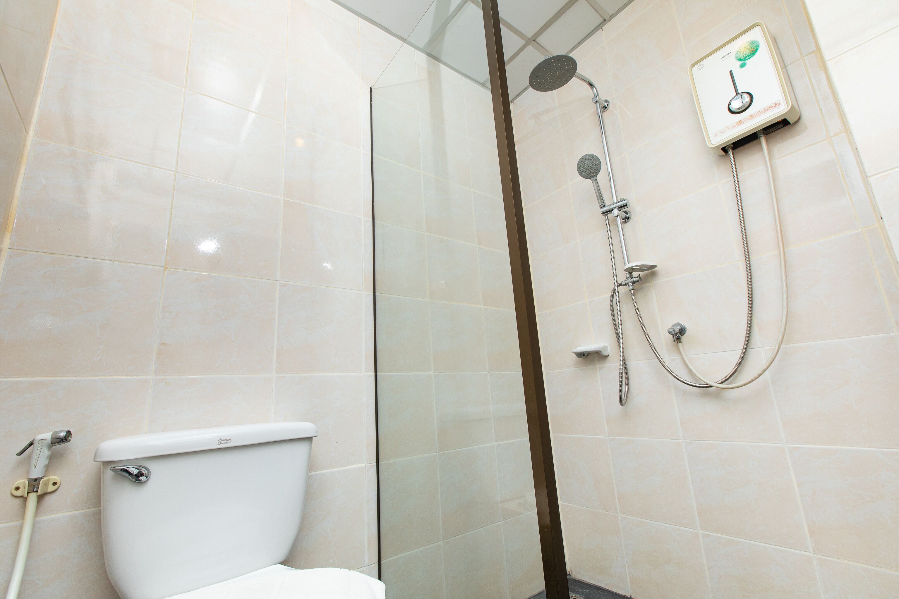 superior double room | bathroom | shower, rainfall showerhead, free toiletries, hair dryer