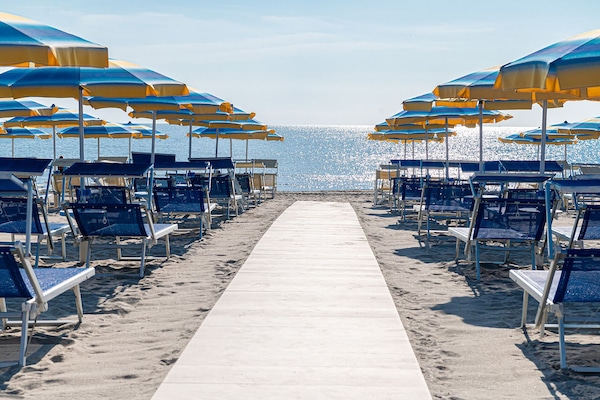 Sun loungers, beach umbrellas
