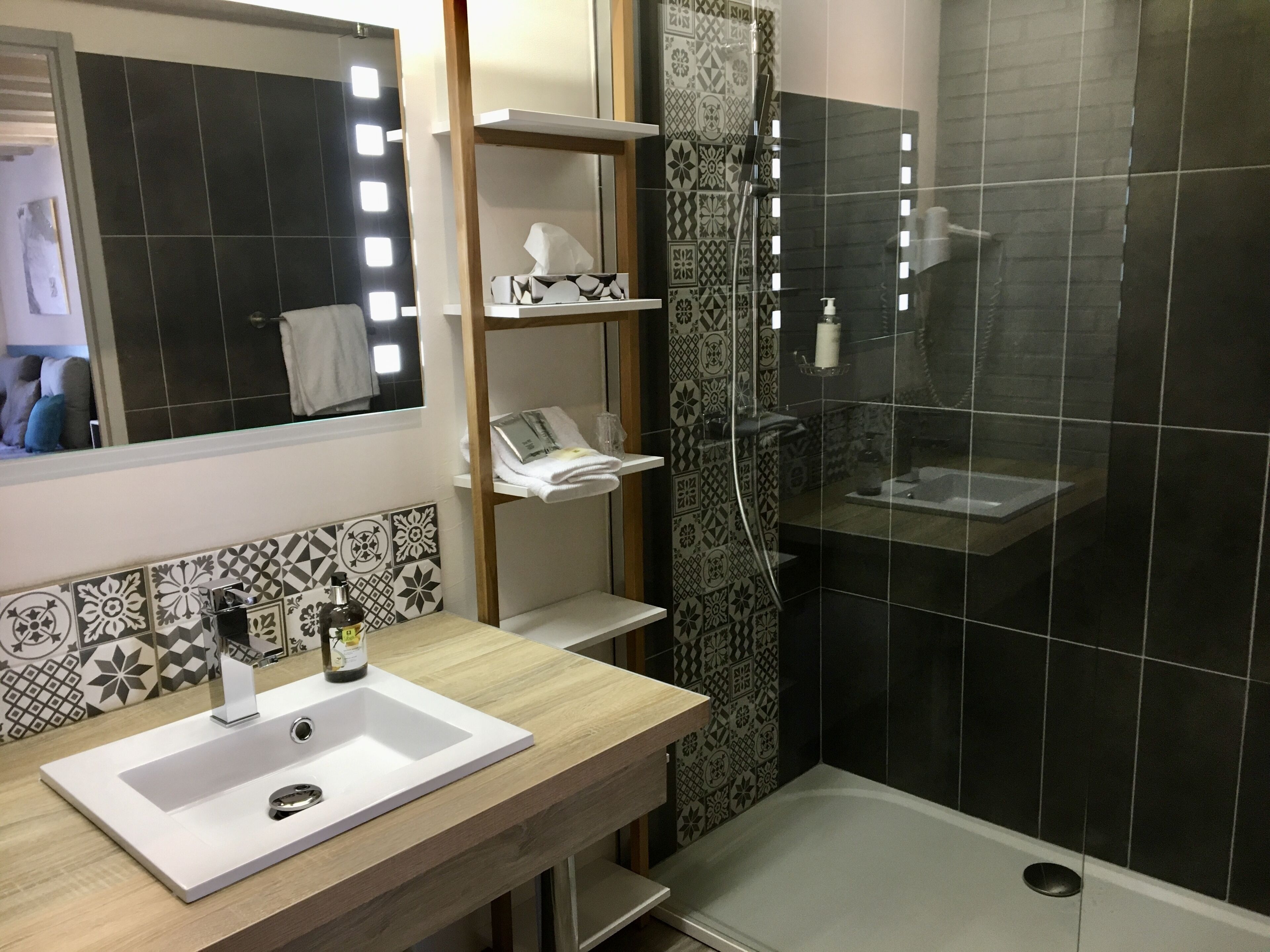 superior single room | bathroom | hair dryer, towels