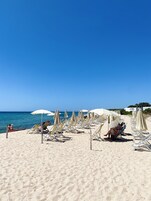 On the beach, white sand, beach umbrellas