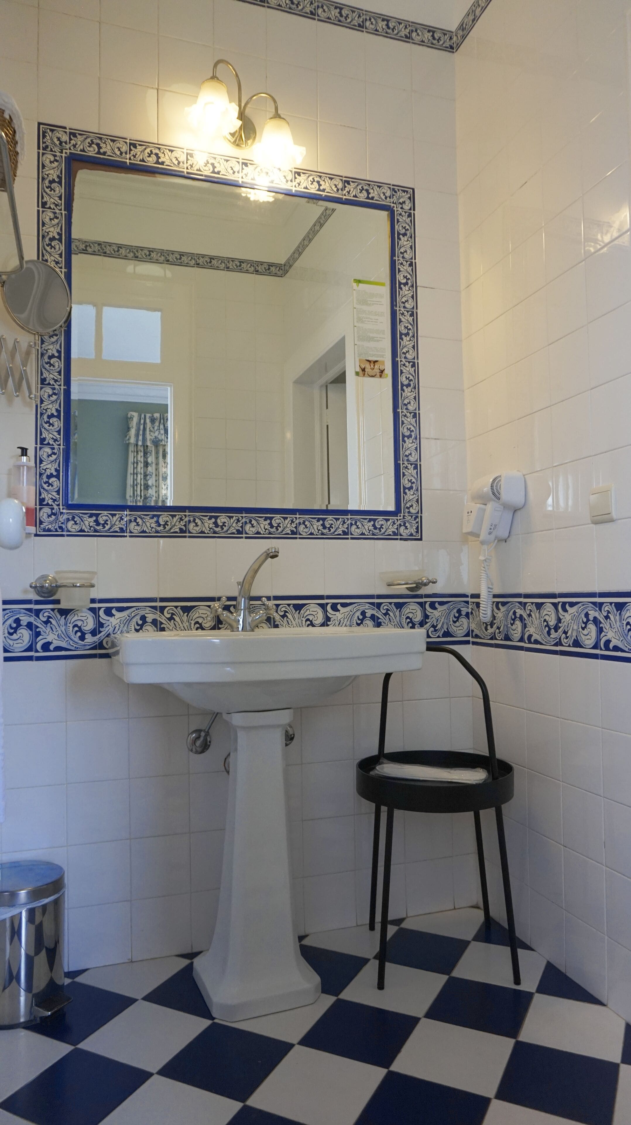 hair dryer, slippers, bidet, towels