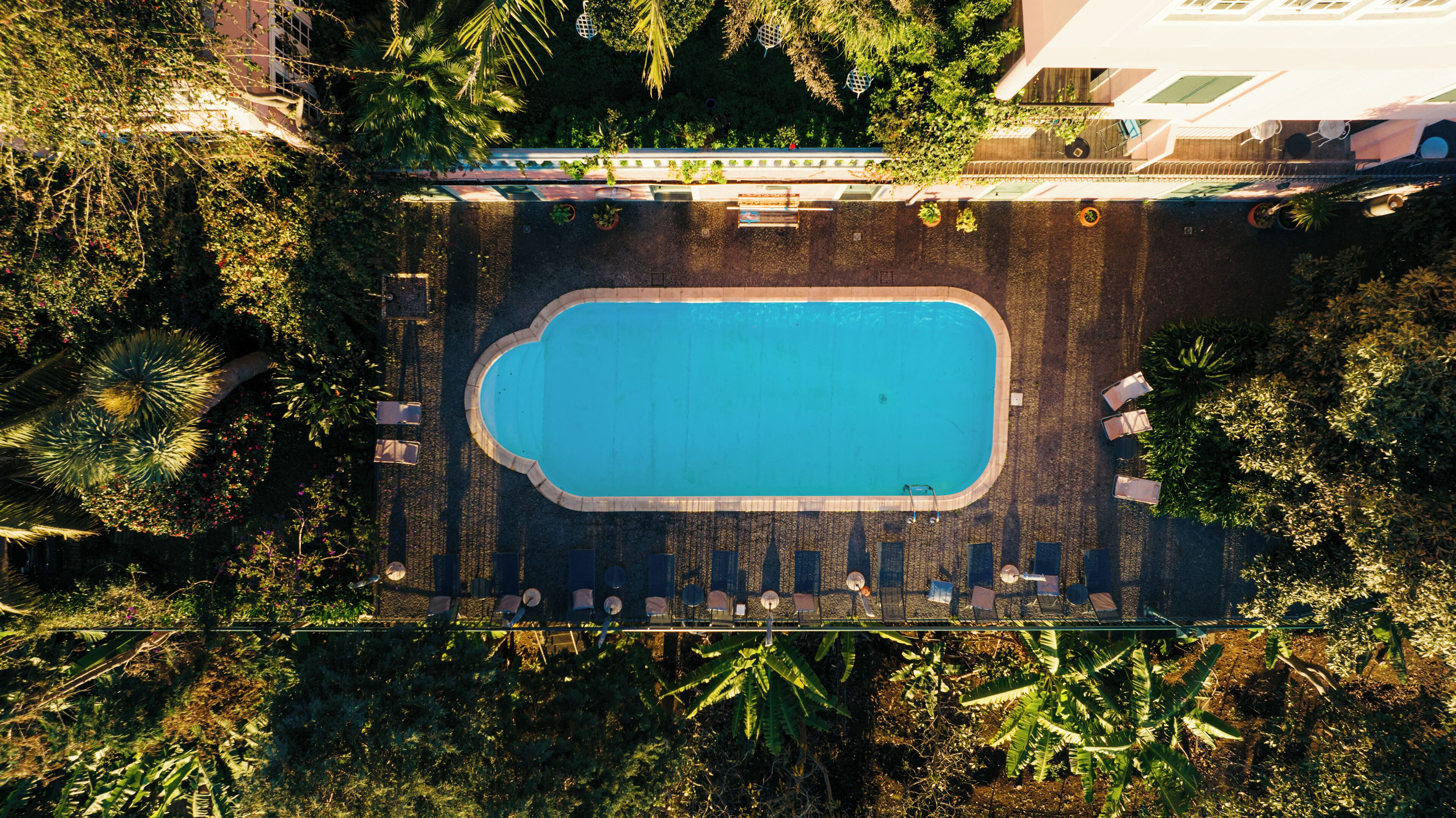 outdoor pool, pool umbrellas, pool loungers