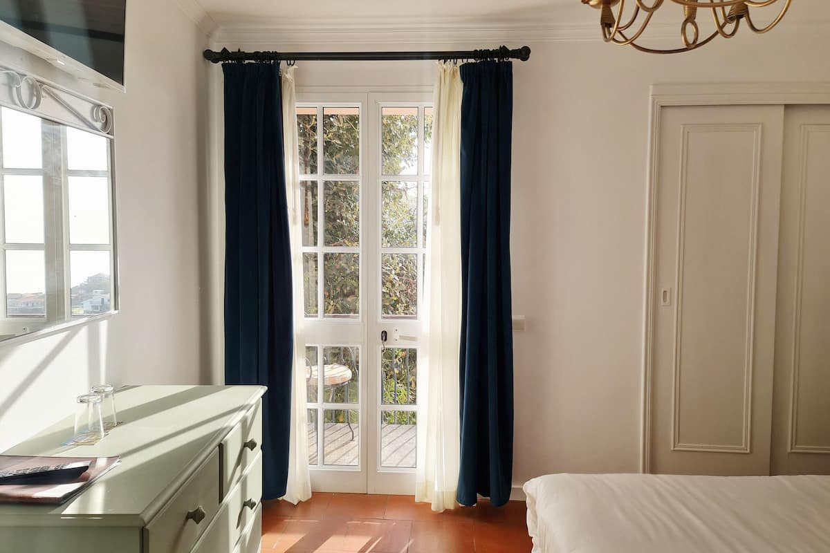 standard double room, pool view | 1 bedroom, in-room safe, individually decorated, individually furnished