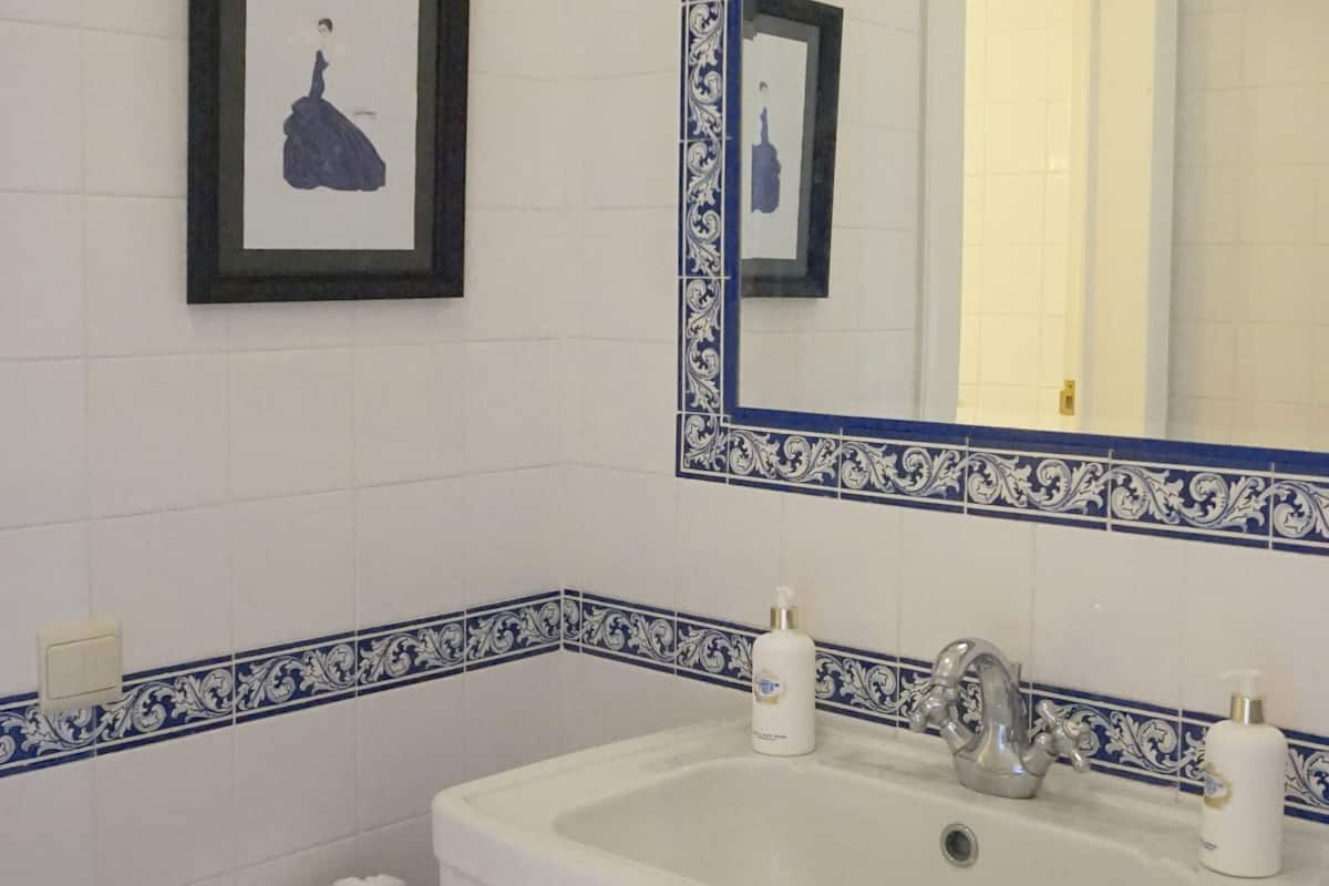 hair dryer, slippers, bidet, towels