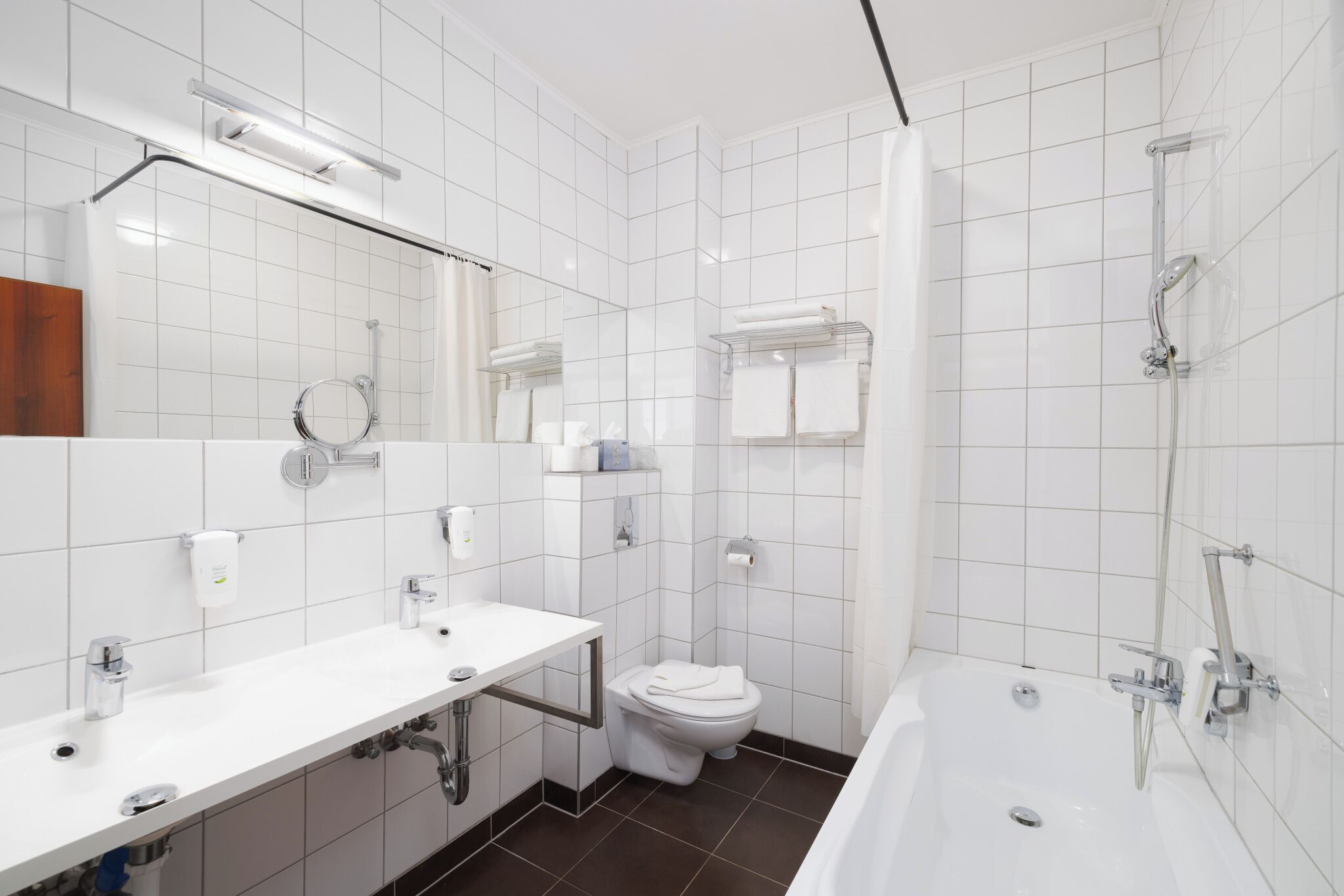 superior studio suite | bathroom | free toiletries, hair dryer, bathrobes, slippers