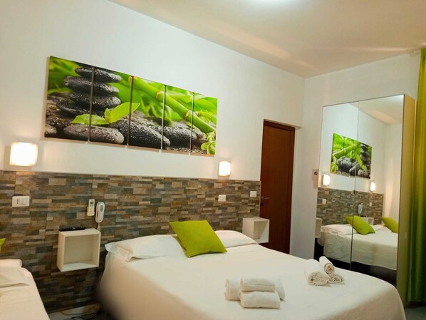 Basic Triple Room, 1 Bedroom | Down duvets, in-room safe, desk, free WiFi - Hotel Birillo (La Spezia)