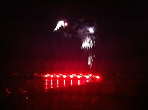 A nighttime scene with fireworks in the sky.