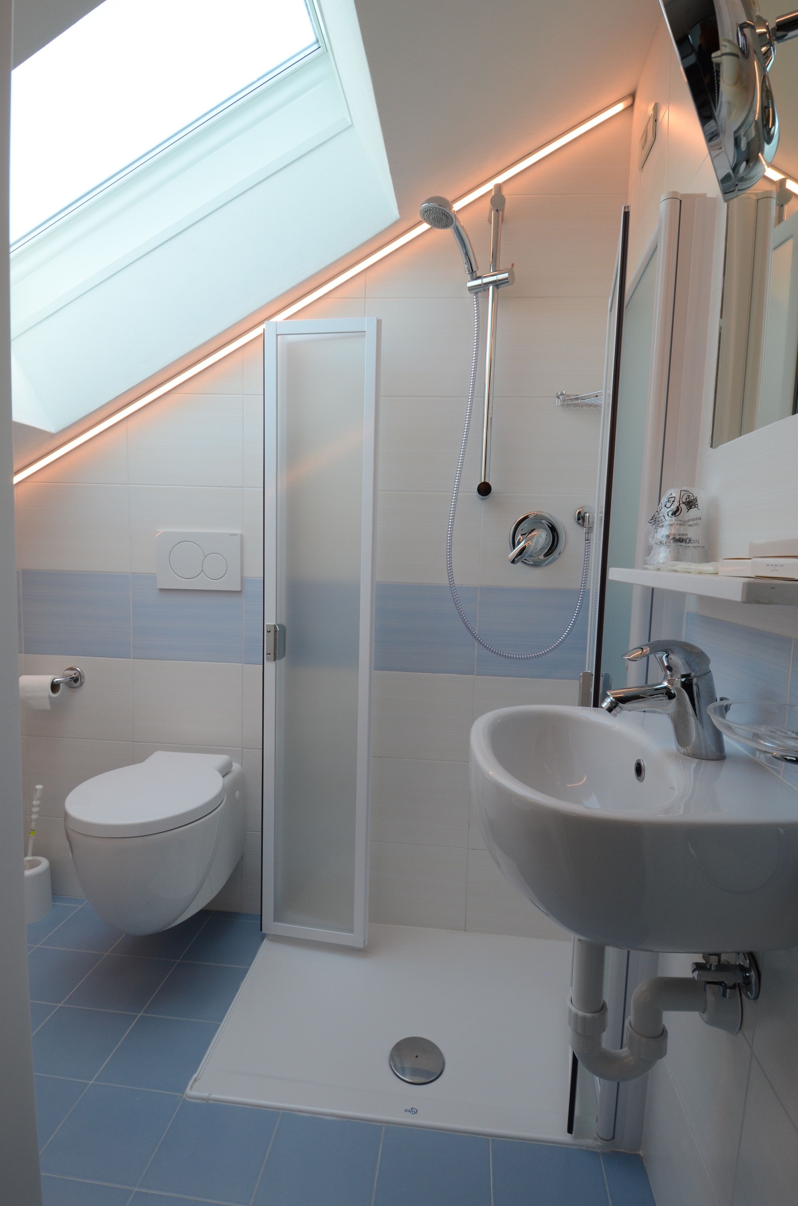 quadruple room | bathroom | shower, hair dryer, towels