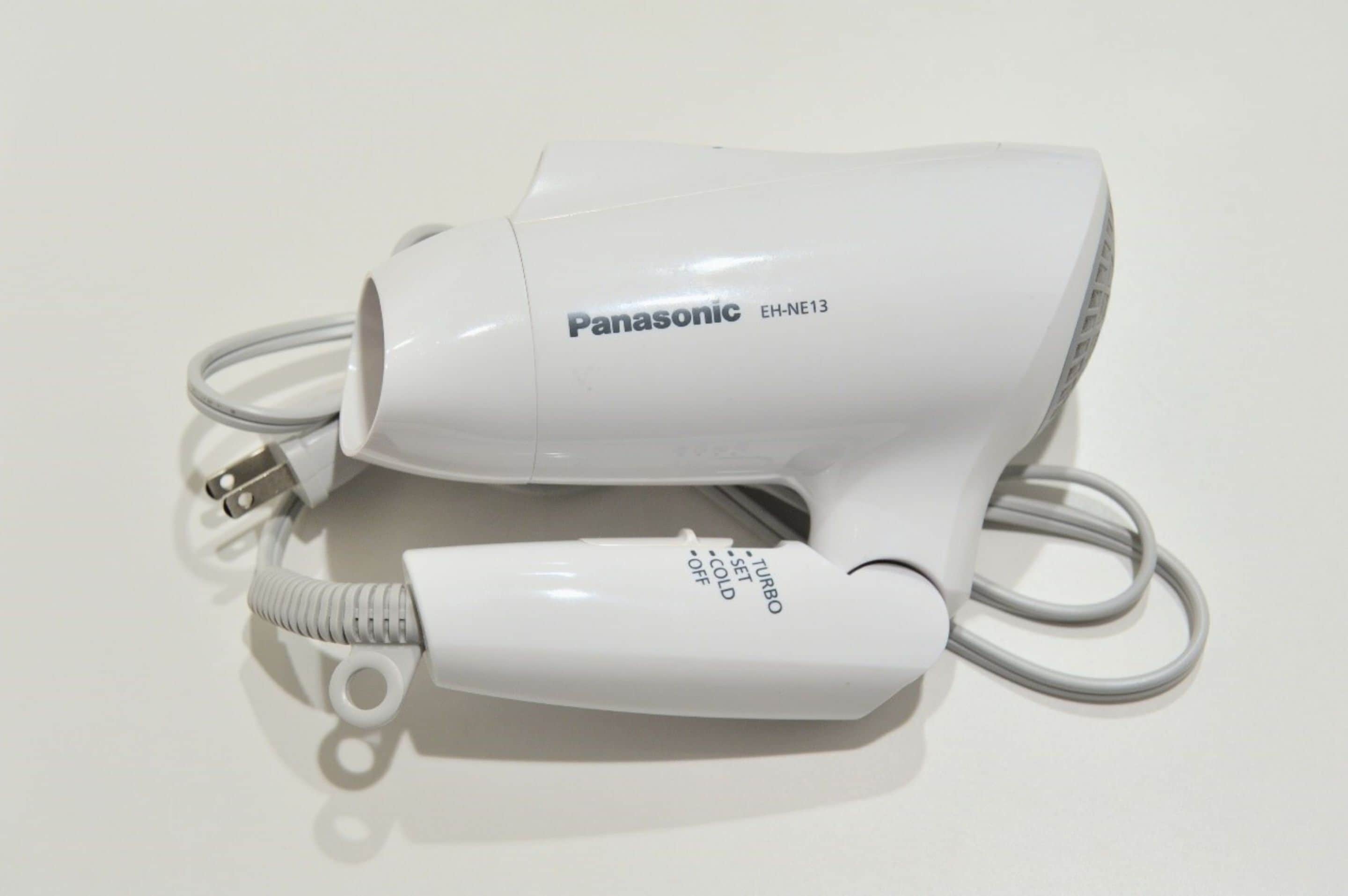 shower, hair dryer, slippers, electronic bidet