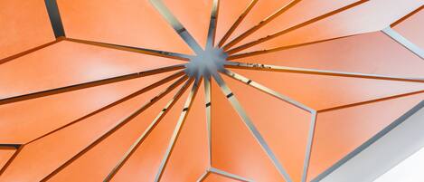A geometric ceiling design with angular panels.