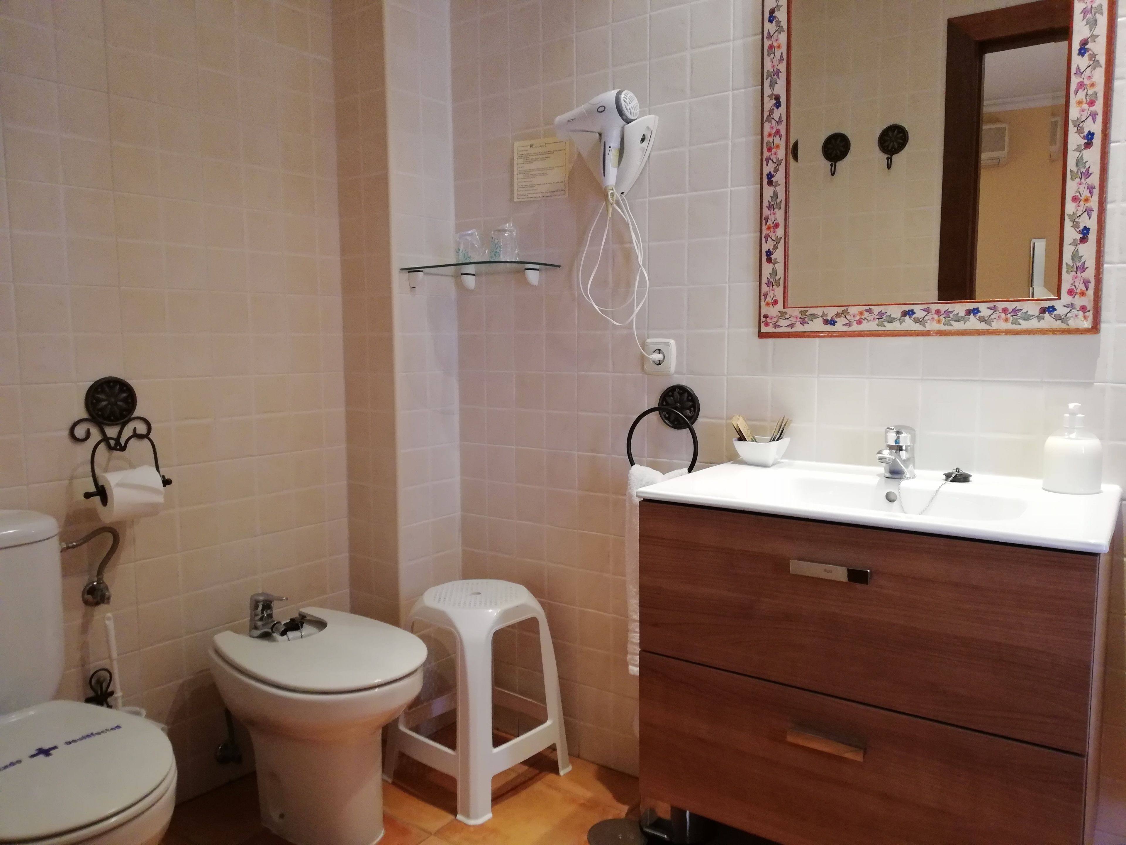 bathtub, hair dryer, towels