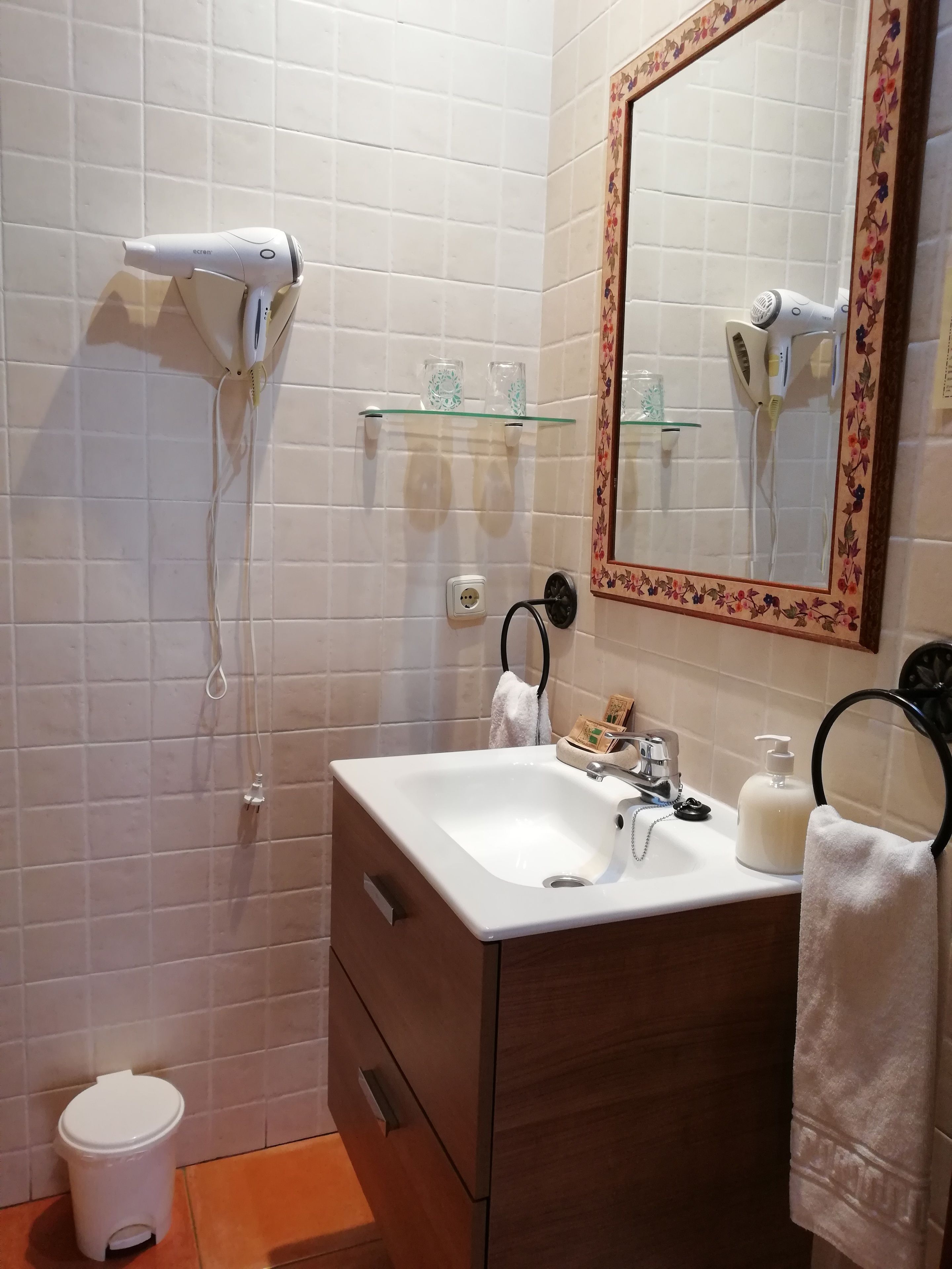 bathtub, hair dryer, towels