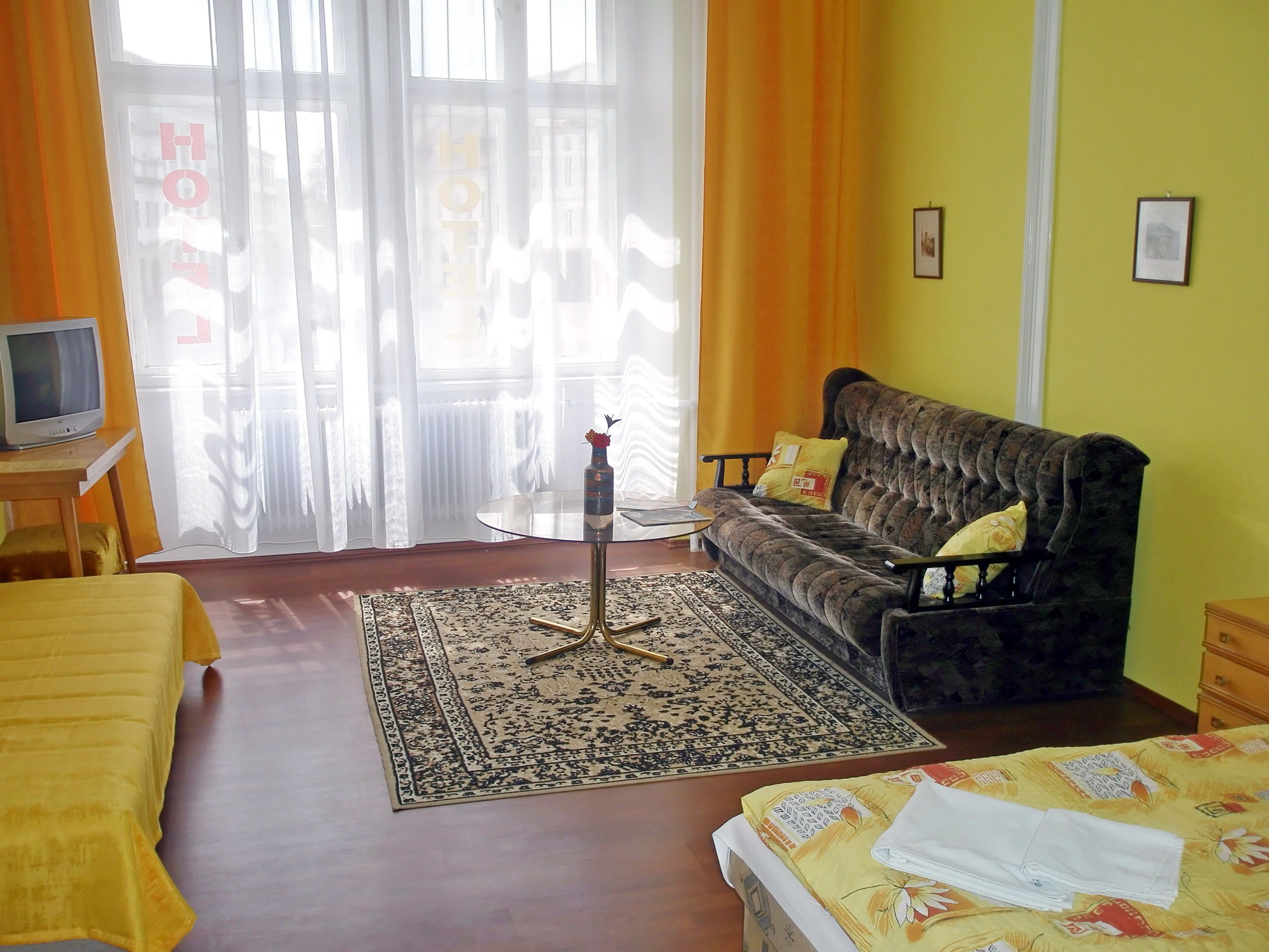 quadruple room | living area | tv