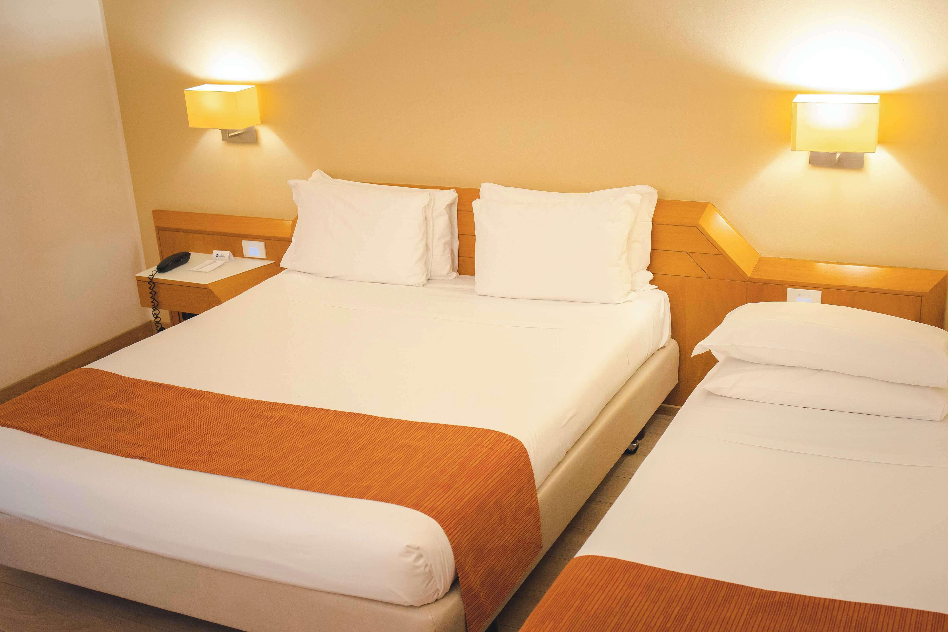 standard room, multiple beds | 1 bedroom, minibar, in-room safe, desk