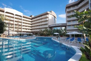 Seasonal outdoor pool, pool umbrellas, pool loungers