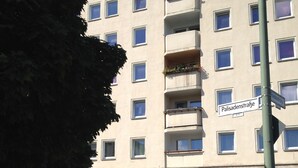 A multi-story hotel with a sign reading "HOTEL - PENSION REITER" at the entrance. - Hotel-Pension Reiter (Berlin)