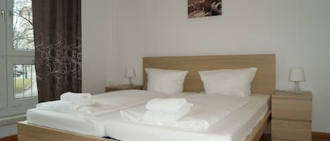 Economy Double or Twin Room, Shared Bathroom | Hypo-allergenic bedding, desk, blackout drapes, iron/ironing board