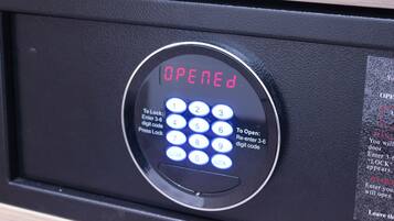 A digital lock panel with a display indicating "OPENED."