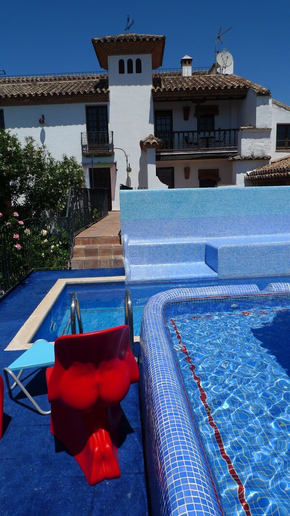 Seasonal outdoor pool, open noon to 7:30 PM, pool loungers