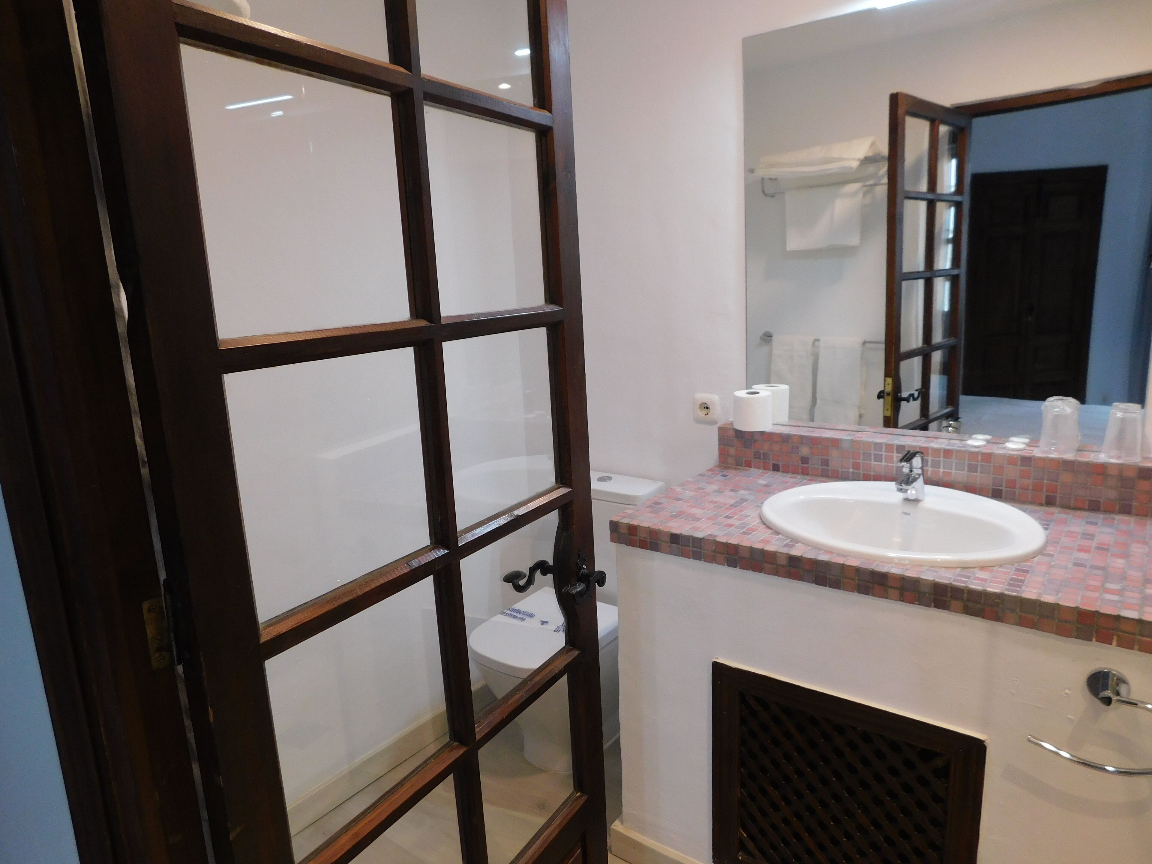 standard double room | bathroom | hair dryer, towels, soap, toilet paper