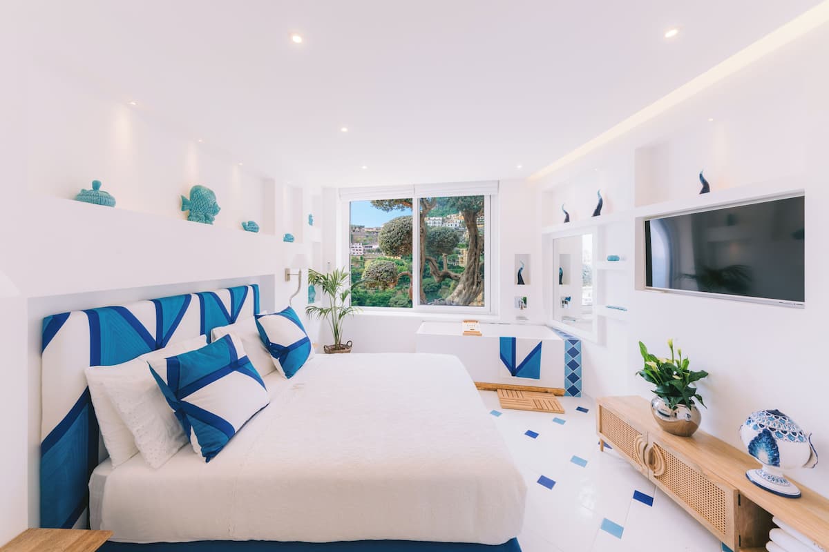 Habitación romántica doble | Ropa de cama de alta calidad y edredones de plumas